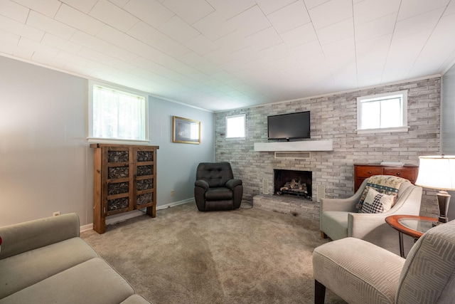 1318 Joiner Rd, Chattanooga, TN 37421 - living room with a fireplace, carpet flooring, and crown molding