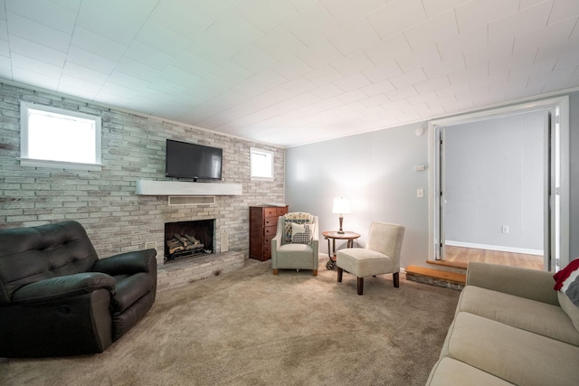 1318 Joiner Rd, Chattanooga, TN 37421 - carpeted living room with a brick fireplace and brick wall