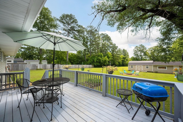1318 Joiner Rd, Chattanooga, TN 37421 - deck featuring grilling area, outdoor dining area, a fenced backyard, and a playground