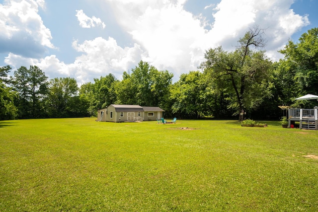 1318 Joiner Rd, Chattanooga, TN 37421 - view of green lawn featuring a wooden deck