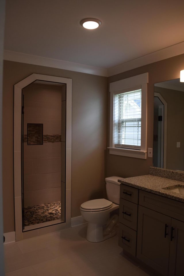 81 Morning Mist Dr, Rossville, GA 30741 - full bathroom featuring vanity, a shower stall, crown molding, and tile patterned flooring