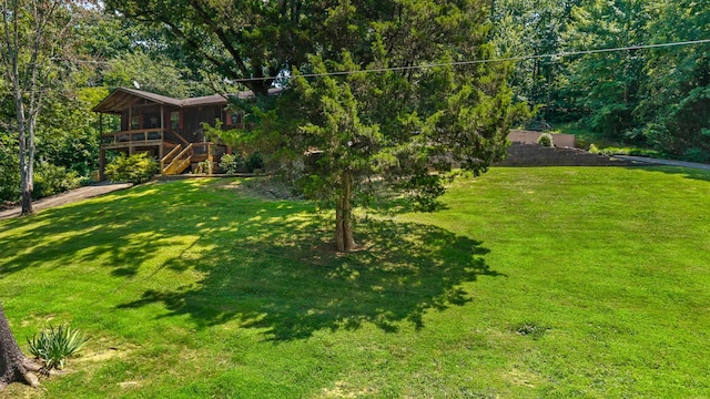 144 Bible Dr, Benton, TN 37307 - view of grassy yard with stairs