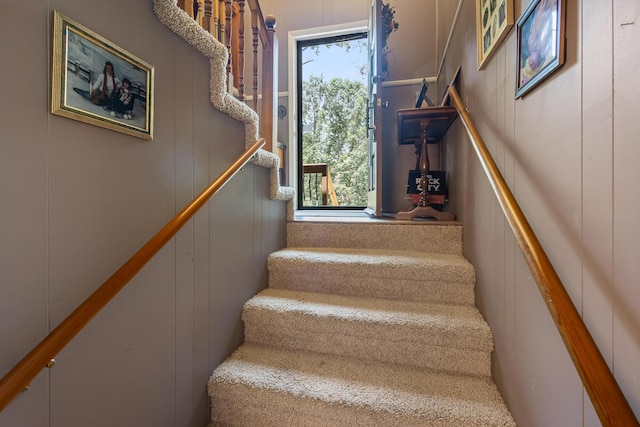 144 Bible Dr, Benton, TN 37307 - staircase featuring a decorative wall and plenty of natural light