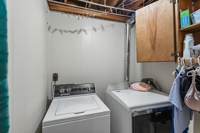 144 Bible Dr, Benton, TN 37307 - laundry room featuring cabinet space and washing machine and dryer