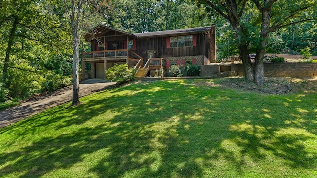 144 Bible Dr, Benton, TN 37307 - view of front of home featuring a front yard, driveway, stairway, and a chimney