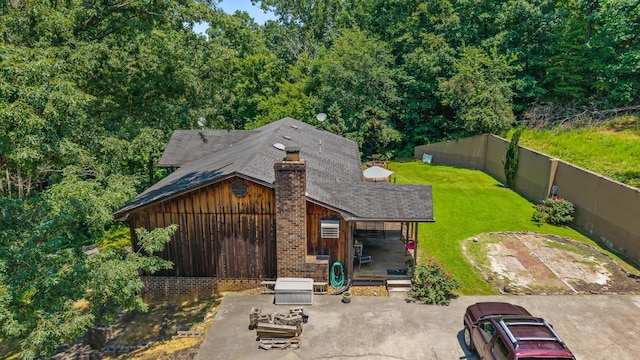 144 Bible Dr, Benton, TN 37307 - back of property with a chimney, a shingled roof, and board and batten siding