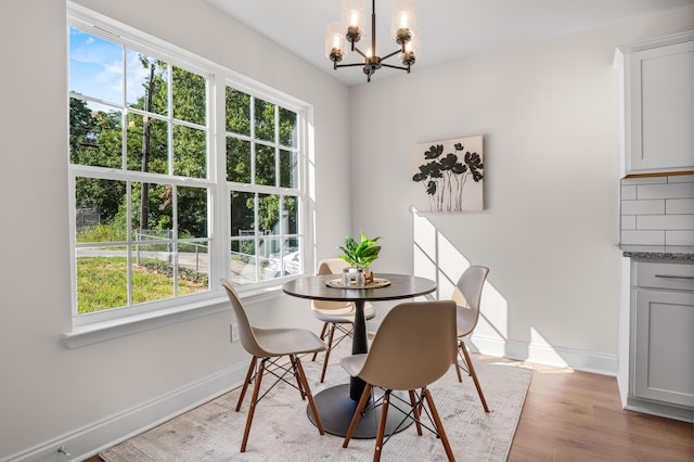 812 Aubrey Ave, Chattanooga, TN 37411 - dining space with a chandelier and light wood-type flooring