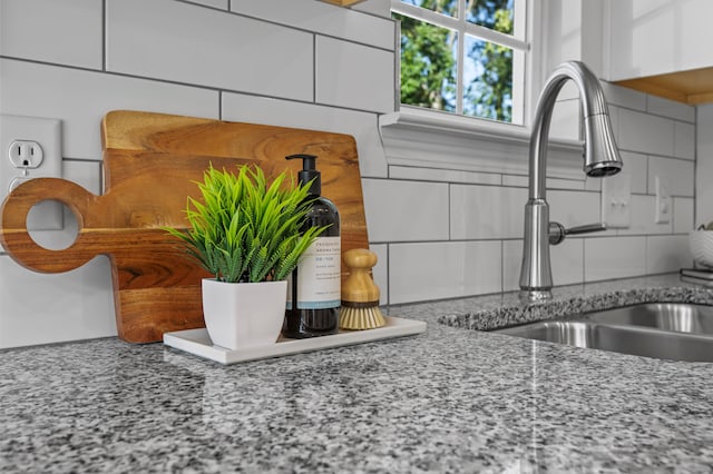 812 Aubrey Ave, Chattanooga, TN 37411 - kitchen view of tasteful backsplash and light stone counters