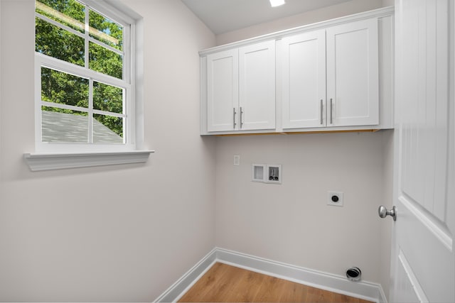 812 Aubrey Ave, Chattanooga, TN 37411 - laundry room with electric dryer hookup, cabinet space, hookup for a washing machine, and light wood-type flooring