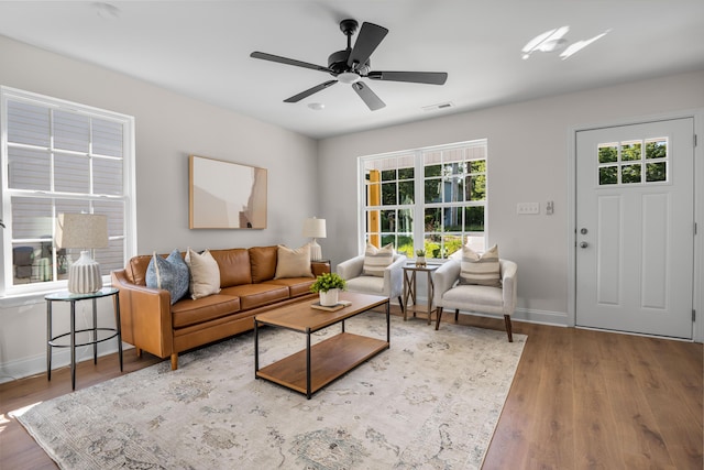 812 Aubrey Ave, Chattanooga, TN 37411 - living area with healthy amount of natural light, wood finished floors, and a ceiling fan