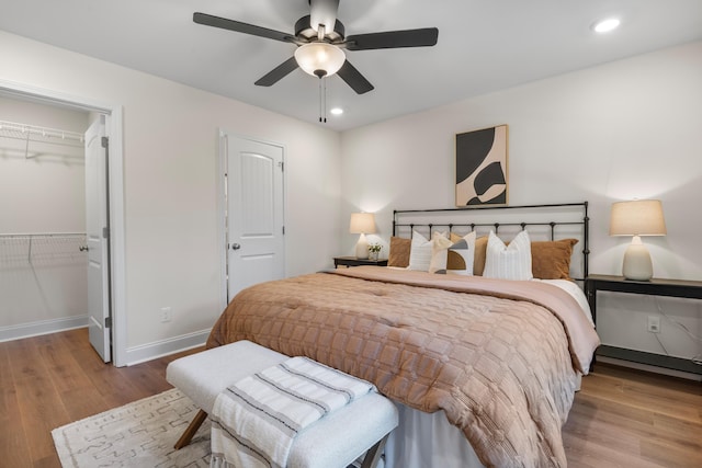 812 Aubrey Ave, Chattanooga, TN 37411 - bedroom featuring wood finished floors, a walk in closet, recessed lighting, a closet, and ceiling fan