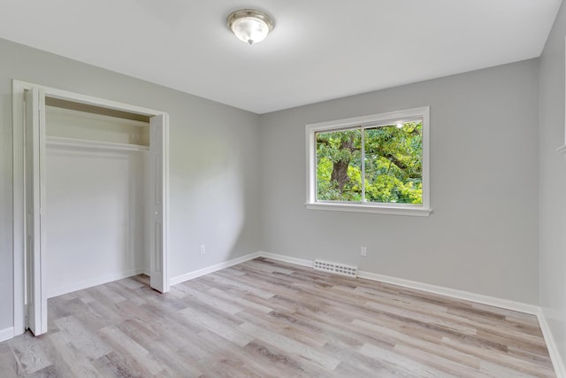 4212 Rogers Rd, Chattanooga, TN 37411 - unfurnished bedroom with wood finished floors and a closet