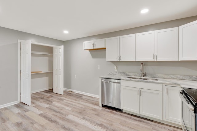 4212 Rogers Rd, Chattanooga, TN 37411 - kitchen featuring appliances with stainless steel finishes, white cabinets, light wood-style flooring, recessed lighting, and light stone countertops