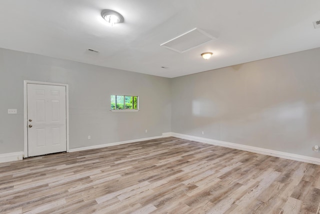 4212 Rogers Rd, Chattanooga, TN 37411 - empty room featuring attic access and light wood finished floors