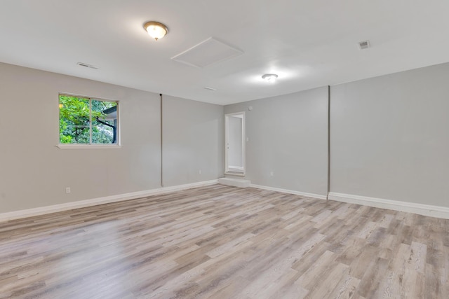 4212 Rogers Rd, Chattanooga, TN 37411 - unfurnished room featuring attic access and light wood-type flooring