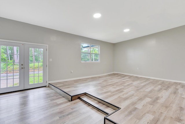 4212 Rogers Rd, Chattanooga, TN 37411 - unfurnished room with french doors, light wood finished floors, and recessed lighting