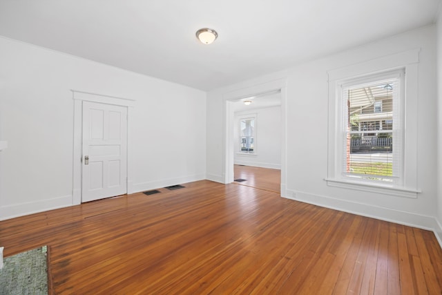 1306 Bailey Ave, Chattanooga, TN 37404 - unfurnished room with hardwood / wood-style flooring and baseboards