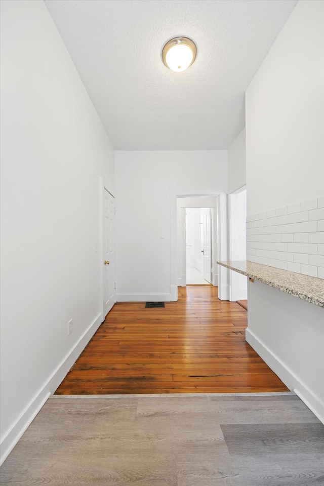 1306 Bailey Ave, Chattanooga, TN 37404 - hallway with wood finished floors and baseboards