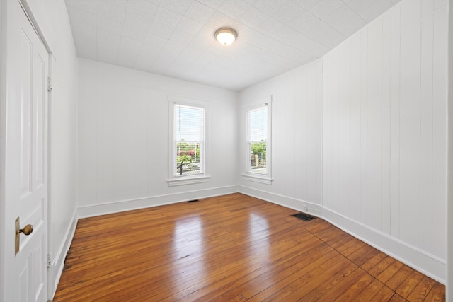1306 Bailey Ave, Chattanooga, TN 37404 - unfurnished room with hardwood / wood-style flooring and baseboards