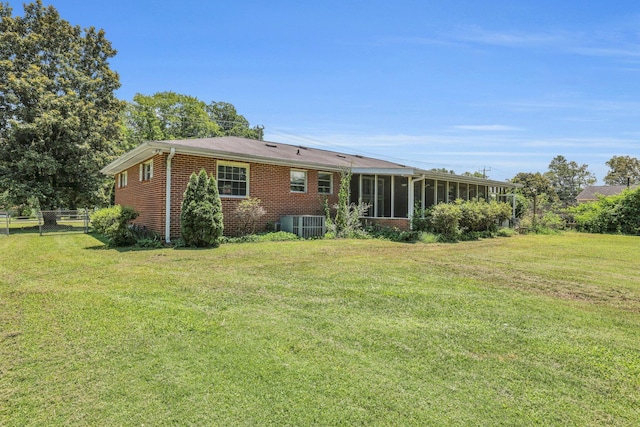 353 Prater Rd, Rossville, GA 30741 - back of house with a sunroom and brick siding