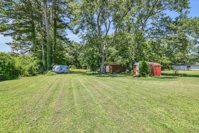 353 Prater Rd, Rossville, GA 30741 - view of green lawn featuring a storage shed