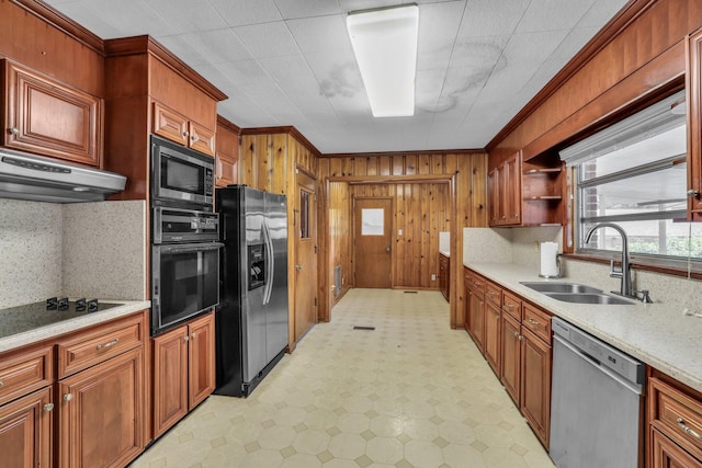 353 Prater Rd, Rossville, GA 30741 - kitchen featuring black appliances, light floors, light countertops, ventilation hood, and wooden walls