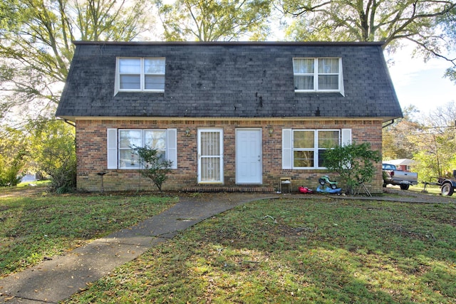 3628 Helen Ln, Chattanooga, TN 37412 - view of front of house with mansard roof, a shingled roof, and a front lawn