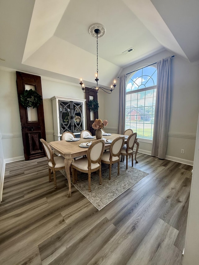 120 Oakhurst Ter NE, Calhoun, GA 30701 - dining area with a chandelier, wood finished floors, and vaulted ceiling