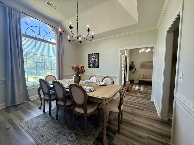 120 Oakhurst Ter NE, Calhoun, GA 30701 - dining area with a chandelier, wood finished floors, ornamental molding, and lofted ceiling