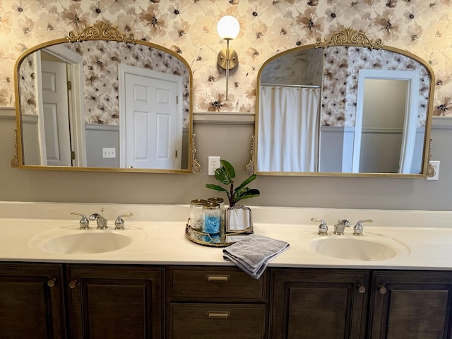 120 Oakhurst Ter NE, Calhoun, GA 30701 - full bath featuring wallpapered walls, double vanity, wainscoting, and a shower with shower curtain