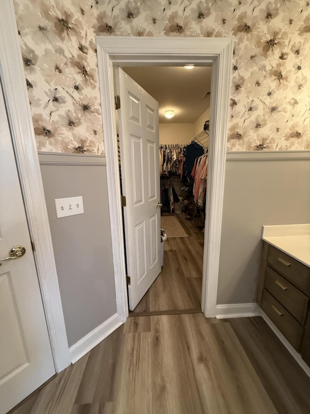 120 Oakhurst Ter NE, Calhoun, GA 30701 - hall featuring wainscoting, wallpapered walls, and wood finished floors