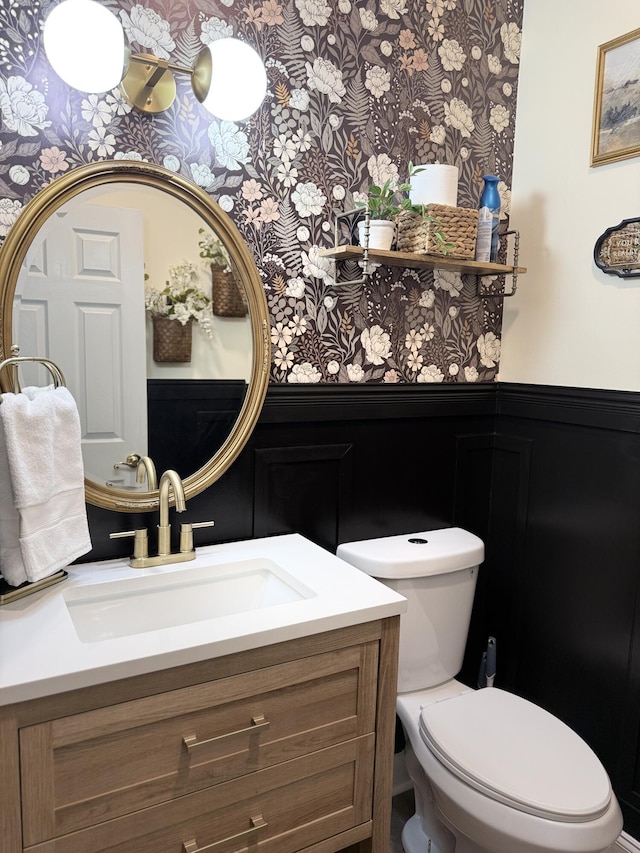 120 Oakhurst Ter NE, Calhoun, GA 30701 - bathroom with wallpapered walls, wainscoting, vanity, and a decorative wall