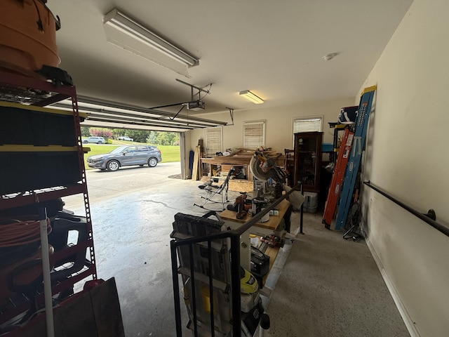 120 Oakhurst Ter NE, Calhoun, GA 30701 - garage featuring a garage door opener and baseboards