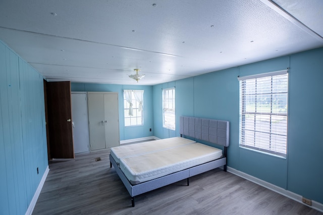 272 Walker Rd, Rossville, GA 30741 - bedroom featuring wood finished floors and a textured ceiling