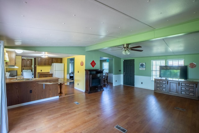 272 Walker Rd, Rossville, GA 30741 - living room featuring ceiling fan, light wood-type flooring, a fireplace, healthy amount of natural light, and wainscoting