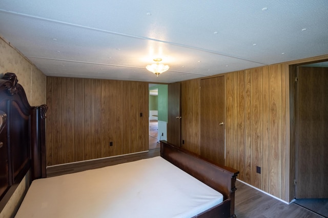 272 Walker Rd, Rossville, GA 30741 - unfurnished bedroom featuring wooden walls and wood finished floors