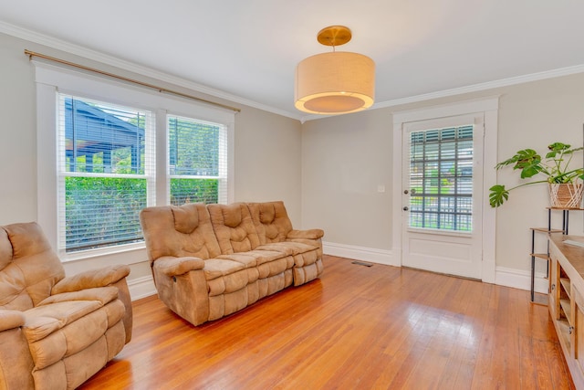 1132 Dartmouth St, Chattanooga, TN 37405 - living area featuring light wood finished floors and ornamental molding
