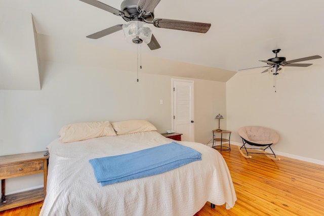1132 Dartmouth St, Chattanooga, TN 37405 - bedroom with light wood-type flooring, vaulted ceiling, and ceiling fan