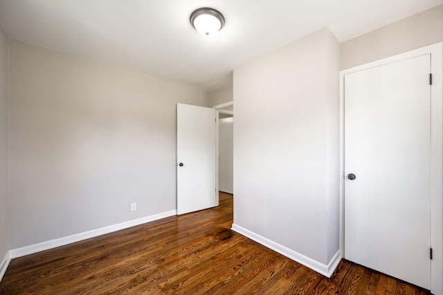 1306 Raydine Ln, Rossville, GA 30741 - unfurnished bedroom featuring dark wood-style floors and baseboards