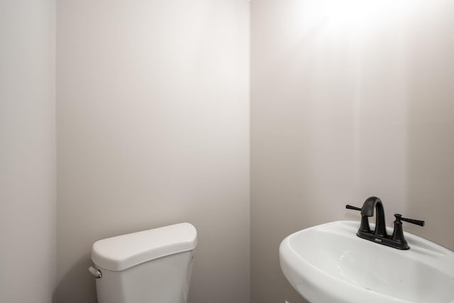 1306 Raydine Ln, Rossville, GA 30741 - half bathroom with a sink and toilet