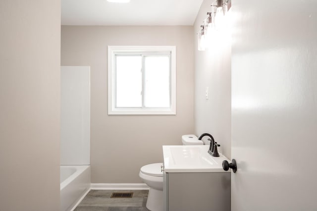 1306 Raydine Ln, Rossville, GA 30741 - full bathroom with vanity, wood finished floors, and tub / shower combination
