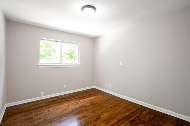 1306 Raydine Ln, Rossville, GA 30741 - spare room with dark wood-style floors and baseboards