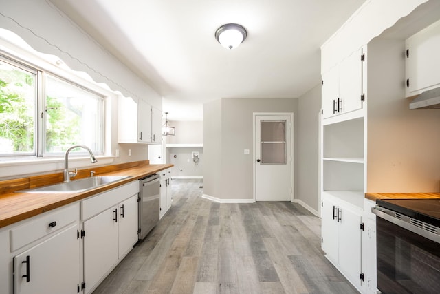 1306 Raydine Ln, Rossville, GA 30741 - kitchen with stainless steel appliances, wood counters, and white cabinetry