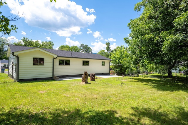 1306 Raydine Ln, Rossville, GA 30741 - back of property with crawl space, a patio area, and a yard