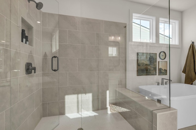 2608 Butlers Green Cir Unit 11, Chattanooga, TN 37421 - bathroom featuring a shower stall and a freestanding bath