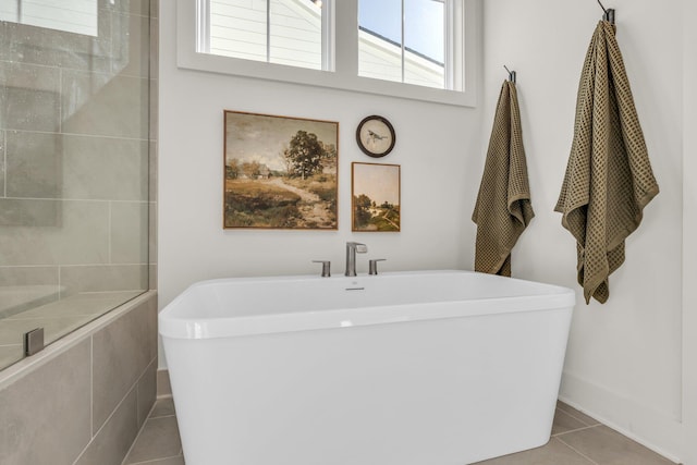 2608 Butlers Green Cir Unit 11, Chattanooga, TN 37421 - full bathroom featuring a freestanding tub, tile patterned flooring, and plenty of natural light