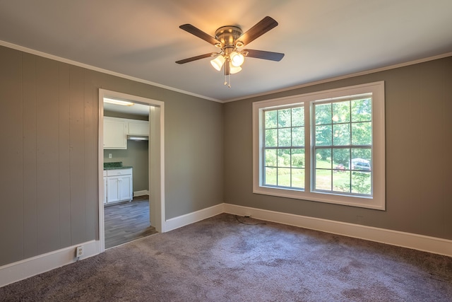 203 S High St, Lafayette, GA 30728 - empty room with dark carpet, ceiling fan, and crown molding