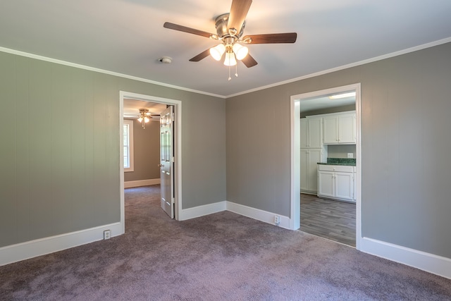 203 S High St, Lafayette, GA 30728 - carpeted empty room with ceiling fan and ornamental molding