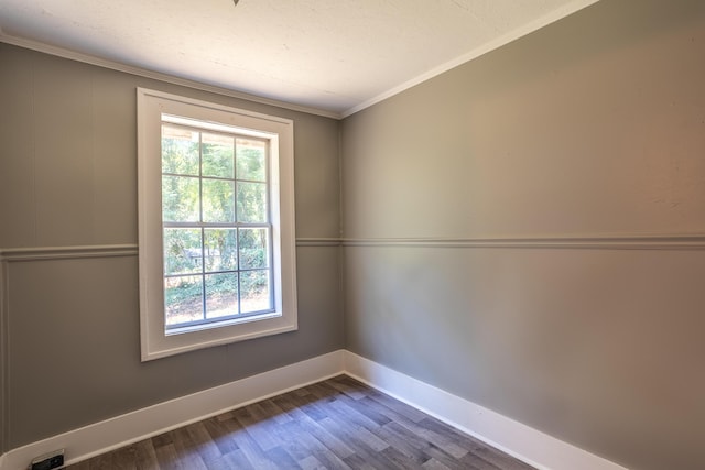 203 S High St, Lafayette, GA 30728 - empty room featuring dark wood-style flooring and ornamental molding