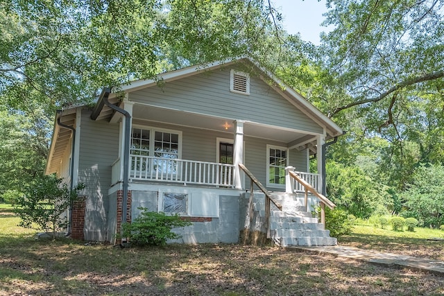203 S High St, Lafayette, GA 30728 - view of front facade featuring covered porch and stairs